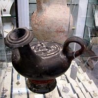 Picture of a vessel that was used to store perfume. The vessel, found in a Jerusalem shop selling illegal antiquities on June 15, 2016, dates back to the fourth century BCE. (Courtesy: Israel Antiquities Authority) Picture of a vessel that was used to store perfume. The vessel, found in a Jerusalem shop selling illegal antiquities on June 15, 2016, dates back to the fourth century BCE. (Courtesy: Israel Antiquities Authority)