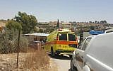 A Magen David Adom ambulance at the site where two children died after being left in a car, in the Al Kaum Regional Council in the Negev, June 22, 2016. (Magen David Adom)