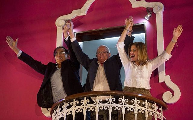 Presidential candidate Pedro Pablo Kuczynski, center, celebrates with his running mates for first and second vice-presidents Martin Vizcarra and Mercedes Araoz, from the balcony of their headquarters in Lima, Peru, June 5, 2016. (AP Photo/Rodrigo Abd) Presidential candidate Pedro Pablo Kuczynski, center, celebrates with his running mates for first and second vice-presidents Martin Vizcarra and Mercedes Araoz, from the balcony of their headquarters in Lima, Peru, June 5, 2016. (AP Photo/Rodrigo Abd)