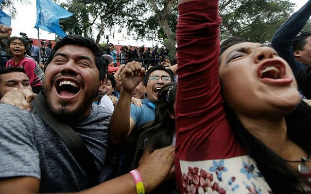 Supporters of presidential candidate Pedro Pablo Kuczynski celebrate in Lima, Peru, Sunday, June 5, 2016. (AP Photo/Martin Mejia) Supporters of presidential candidate Pedro Pablo Kuczynski celebrate in Lima, Peru, Sunday, June 5, 2016. (AP Photo/Martin Mejia)