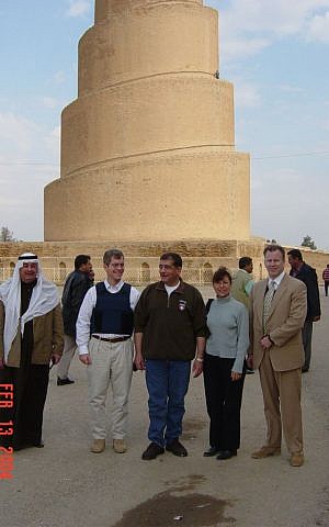 In this photo dated February 13, 2014, Robert Silverman (2nd from left) poses in front of the Great Mosque of Samarra, about 125 kilometers north of Baghdad. (Courtesy American Foreign Service Association)