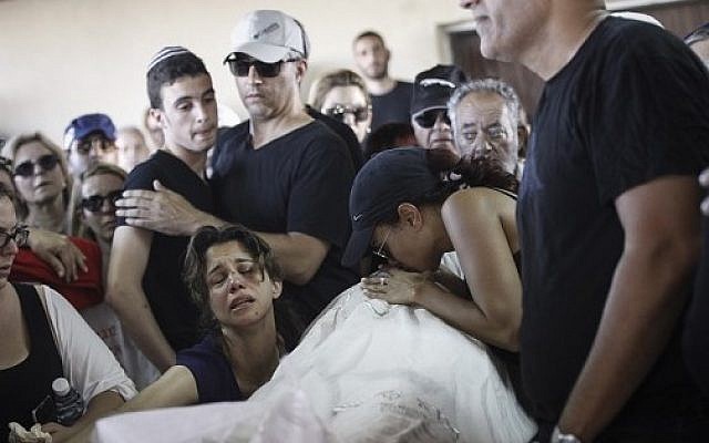 Family and friends mourn the death of Ido Ben Ari, murdered in a shooting attack at the Sarona Market in Tel Aviv, June 9, 2016. (Photo by Miriam Alster/Flash90) Family and friends mourn the death of Ido Ben Ari, murdered in a shooting attack at the Sarona Market in Tel Aviv, June 9, 2016. (Photo by Miriam Alster/Flash90)