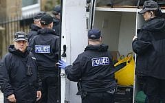 Police continue to search the crime scene in Birstall, West Yorkshire, England Friday, June 17, 2016 the day after Labour MP Jo Cox was murdered in the street outside her constituency advice surgery. (Danny Lawson/PA via AP)