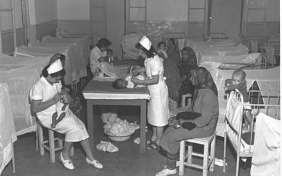 A nursery at the Rosh Ha'ayin refugee camp housing Yemenite Jewish immigrants in the 1950s (Brauner Teddy/GPO)