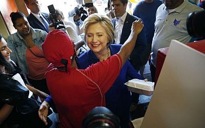 Democratic presidential candidate Hillary Clinton visits a restaurant in Watts California, June 6, 2016. (AP Photo/John Locher)