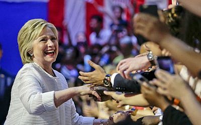 Democratic presidential candidate Hillary Clinton greets supporters as she arrives to speak during a presidential primary election rally, Tuesday, June 7, 2016, in New York. (AP Photo/Julie Jacobson)