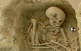 This undated picture provided by the Paliambela Excavation Project Archive, shows a human burial from the archaeological site of Paliambela in northern Greece. (K. Kotsakis, P. Halstead/Paliambela Excavation Project Archive via AP)
