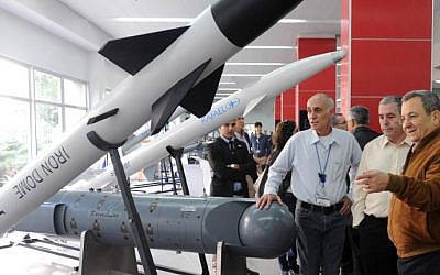Former defense minister Ehud Barak visits a Rafael Advanced Defense Systems production plant on November 27, 2012. (Alon Bason/Defense Ministry/Flash90)