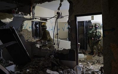 A file photo of Israeli soldiers demolishing the West Bank home of a terrorist in March, 2016 (IDF Spokesperson)