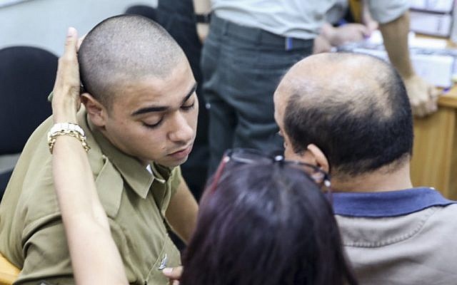 IDF Sgt. Elor Azaria appears in Jaffa military court on June 1, 2016, for the first day of testimony in his manslaughter trial for shooting a disarmed Palestinian attacker in Hebron in March. (Flash90) IDF Sgt. Elor Azaria appears in Jaffa military court on June 1, 2016, for the first day of testimony in his manslaughter trial for shooting a disarmed Palestinian attacker in Hebron in March. (Flash90)