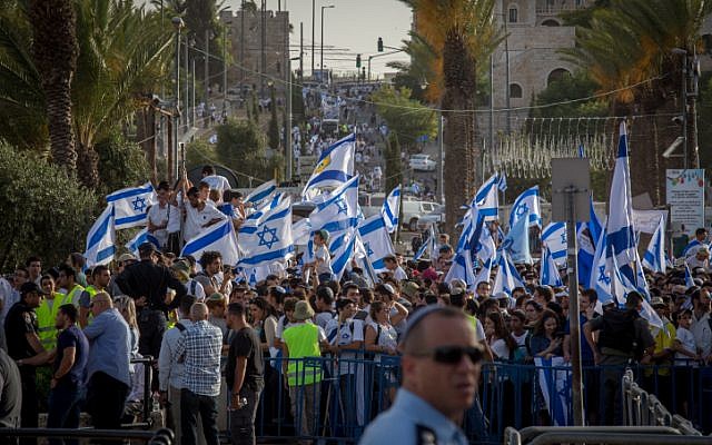 Thousands of young Jewish boys wave Israeli flags as they celebrate Jerusalem Day, dancing and marching their way through Damascus Gate to the Western Wall, on June 05, 2016. (Nati Shohat/Flash90) Thousands of young Jewish boys wave Israeli flags as they celebrate Jerusalem Day, dancing and marching their way through Damascus Gate to the Western Wall, on June 05, 2016. (Nati Shohat/Flash90)