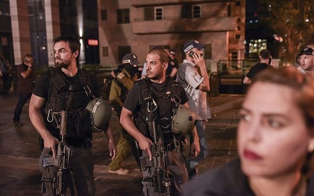 Israeli medical and security forces at the scene of a terrorist attack at the Sarona Market shopping center, Tel Aviv, June 8, 2016. (Ben Kelmer/Flash90) Israeli medical and security forces at the scene of a terrorist attack at the Sarona Market shopping center, Tel Aviv, June 8, 2016. (Ben Kelmer/Flash90)