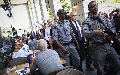 Defense Minister Avigdor Liberman at Sarona Market shopping center in Tel Aviv, on June 9, 2016. (Miriam Alster/Flash90)