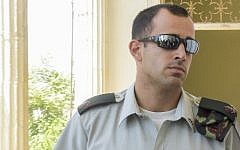 Maj. Tom Na'aman, commanding officer of Elor Azaria, arrives for a court hearing at the Jaffa Military Court, June 16, 2016. (Flash90)