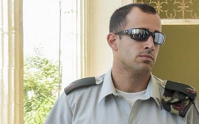 Maj. Tom Na'aman, commanding officer of Elor Azaria, arrives for a court hearing at the Jaffa Military Court, June 16, 2016. (Flash90) Maj. Tom Na'aman, commanding officer of Elor Azaria, arrives for a court hearing at the Jaffa Military Court, June 16, 2016. (Flash90)