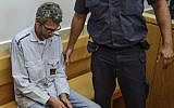 Chen Ayalti seen at the Nazareth District Courton June 19, 2016, where he was accused of murdering his mother, Miriam, at her home in the Mahanaim Kibbutz in April. (Basel Awidat/Flash90)