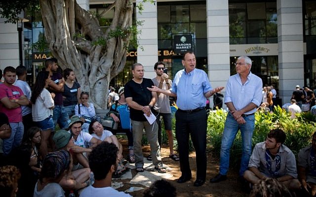 Tel Aviv mayor Ron Huldai speaks to young Israelis at the Sarona Market shopping center in Tel Aviv, on June 9, 2016, the morning after a fatal terror attack claimed the lives of four people. (Miriam Alster/Flash90) Tel Aviv mayor Ron Huldai speaks to young Israelis at the Sarona Market shopping center in Tel Aviv, on June 9, 2016, the morning after a fatal terror attack claimed the lives of four people. (Miriam Alster/Flash90)