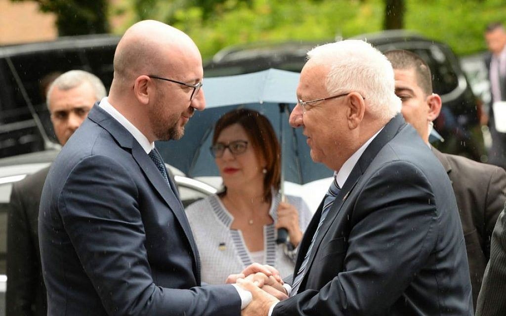 Belgian Prime Minister Charles Michel, left, welcomes President Reuven Rivlin in Brussels, Belgium on June 20, 2016. (Mark Neyman/GPO)