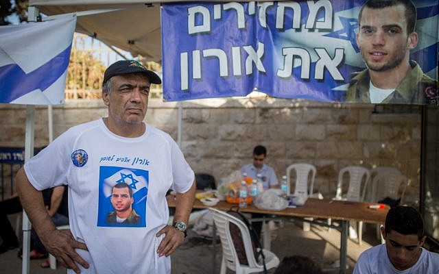 Herzl Shaul, father of late Israeli soldier Oron Shaul, stands at the protest tent outside the Prime Minister's Residence in Jerusalem on June 26, 2016 (Yonatan Sindel/Flash90) Herzl Shaul, father of late Israeli soldier Oron Shaul, stands at the protest tent outside the Prime Minister's Residence in Jerusalem on June 26, 2016 (Yonatan Sindel/Flash90)