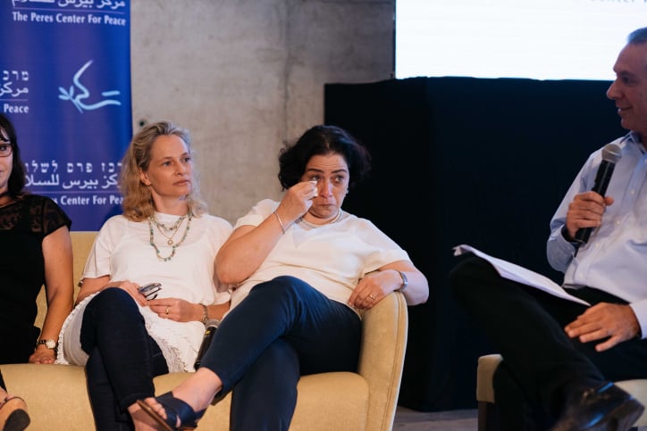 Survivor Dana Zuckerman cries next to fellow survivor Anat Brodesky Charniak during an event makring 40 years since Operation Thunderbolt, the Israeli rescue of over 100 hostages from the Entebbe Airport in Uganda on July 4, 1976, at the Peres Center for Peace in Jaffa on June 27, 2016. (Ben Kelmer/FLASH90) Survivor Dana Zuckerman cries next to fellow survivor Anat Brodesky Charniak during an event makring 40 years since Operation Thunderbolt, the Israeli rescue of over 100 hostages from the Entebbe Airport in Uganda on July 4, 1976, at the Peres Center for Peace in Jaffa on June 27, 2016. (Ben Kelmer/FLASH90)
