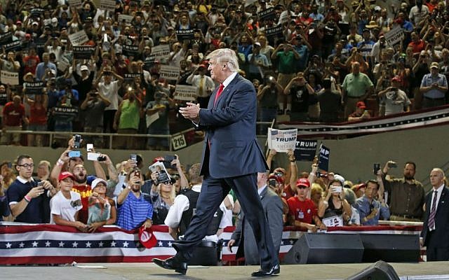Republican presidential candidate Donald Trump arrives to speak at a rally Saturday, June 18, 2016, in Phoenix, Arizona. (AP Photo/Ross D. Franklin)