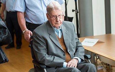 94-year-old former SS guard at the Auschwitz death camp Reinhold Hanning, arrives at a courtroom in Detmold, Germany, Saturday June 11, 2016. (Bernd Thissen/Pool Photo via AP)