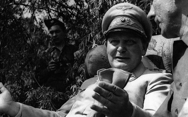 Hermann Goering speaking with a foreign journalist in his private garden in Augsburg, Germany, May 13, 1945. (Getty Images via JTA)