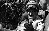 Hermann Goering speaking with a foreign journalist in his private garden in Augsburg, Germany, May 13, 1945. (JTA/Getty Images)