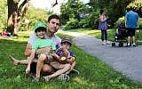 Steven I. Weiss with his two sons. (Humans of New York/Facebook via JTA)