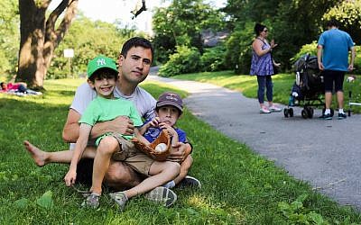 Steven I. Weiss with his two sons. (Humans of New York/Facebook via JTA)