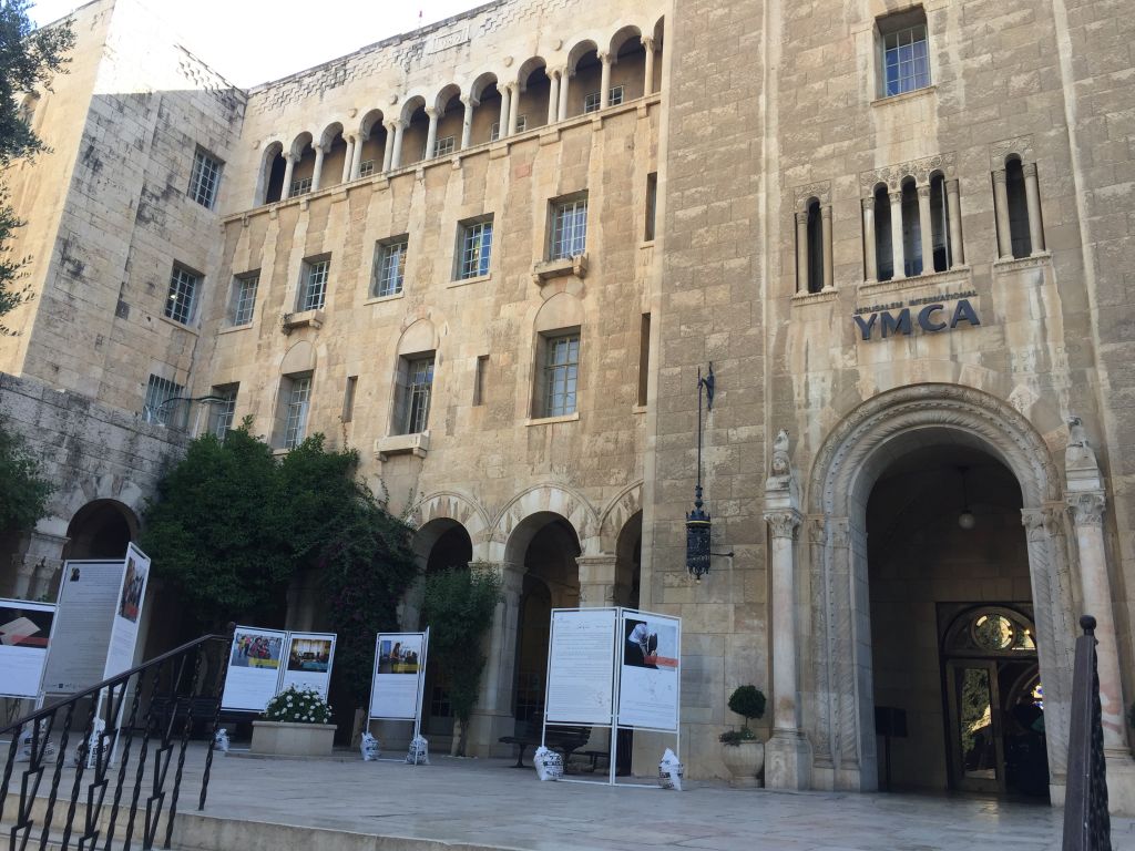 A view of the historic Jerusalem YMCA, where the Teachers' Room photo exhibit is currently being displayed, and where other coexistence projects, including an Arab-Jewish daycare program and youth choir are also held (Jessica Steinberg/Times of Israel) A view of the historic Jerusalem YMCA, where the Teachers' Room photo exhibit is currently being displayed, and where other coexistence projects, including an Arab-Jewish daycare program and youth choir are also held (Jessica Steinberg/Times of Israel)