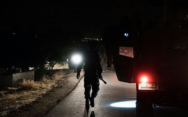 IDF troops surround the West Bank town of Yatta, the home of two terrorists who carried out a deadly shooting attack in Tel Aviv's Sarona Market, June 9, 2016. (IDF Spokesman)