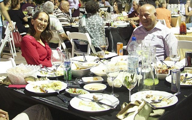 Tachsim Jaber (right) and Ravit Boged (left) eating together. (Dov Lieber / Times of Israel) Tachsim Jaber (right) and Ravit Boged (left) eating together. (Dov Lieber / Times of Israel)