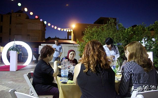 Jews and Arabs sharing an Iftar (breakfast) together during the month of Ramadan, in the town of Taybeh, June 9th, 2016. (Dov Lieber / Times of Israel) Jews and Arabs sharing an Iftar (breakfast) together during the month of Ramadan, in the town of Taybeh, June 9th, 2016. (Dov Lieber / Times of Israel)