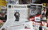 Il Giornale newspaper is seen on sale in a newsstand with Hitler's 'Mein Kampf,' in Rome Saturday, June 11, 2016. (AP/Fabio Frustaci)