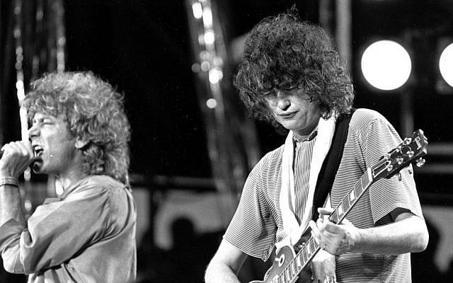 In this July 13, 1985 file photo, singer Robert Plant, left, and guitarist Jimmy Page of the British rock band Led Zeppelin perform at the Live Aid concert at Philadelphia's JFK Stadium. (AP Photo/Rusty Kennedy, File)