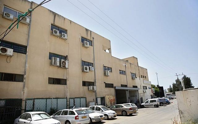Israeli police say this building served as the headquarters of an international scam operation that duped global companies out of more than $10 million, in the coastal city of Netanya, Israel, Tuesday, June 7, 2016. (AP Photo/Ariel Schalit) Israeli police say this building served as the headquarters of an international scam operation that duped global companies out of more than $10 million, in the coastal city of Netanya, Israel, Tuesday, June 7, 2016. (AP Photo/Ariel Schalit)