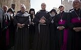 The new Custos of the Catholic Church's properties in the Holy Land Italian Franciscan priest Rev. Francesco Patton, center, stands during a procession in Jerusalem's Old City, Monday, June 6, 2016. (AP Photo/Ariel Schalit)