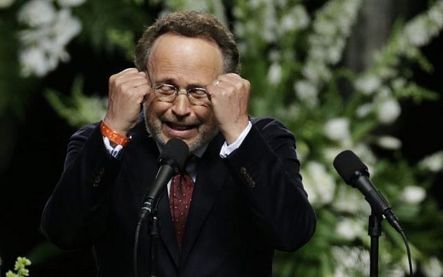 Comedian Billy Crystal imitates Muhammad Ali during his memorial service, Friday, June 10, 2016, in Louisville, Ky. (AP Photo/David Goldman) Comedian Billy Crystal imitates Muhammad Ali during his memorial service, Friday, June 10, 2016, in Louisville, Ky. (AP Photo/David Goldman)