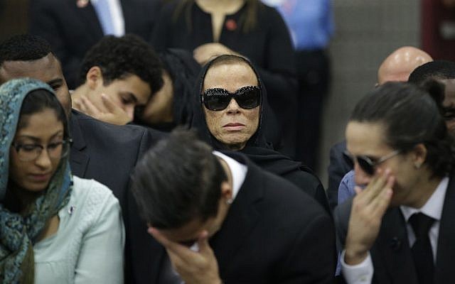 Muhammad Ali's wife, Lonnie (center), attends Muhammad Ali's Jenazah, a traditional Islamic Muslim service, in Louisville, Kentucky, on June 9, 2016. (AP/Darron Cummings) Muhammad Ali's wife, Lonnie (center), attends Muhammad Ali's Jenazah, a traditional Islamic Muslim service, in Louisville, Kentucky, on June 9, 2016. (AP/Darron Cummings)