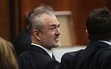 Nick Denton, founder of Gawker, talks with his legal team before Terry Bollea, aka Hulk Hogan, testifies in court during his trial against Gawker Media at the Pinellas County Courthouse on March 8, 2016 in St Petersburg, Florida. (John Pendygraft-Pool/Getty Images)