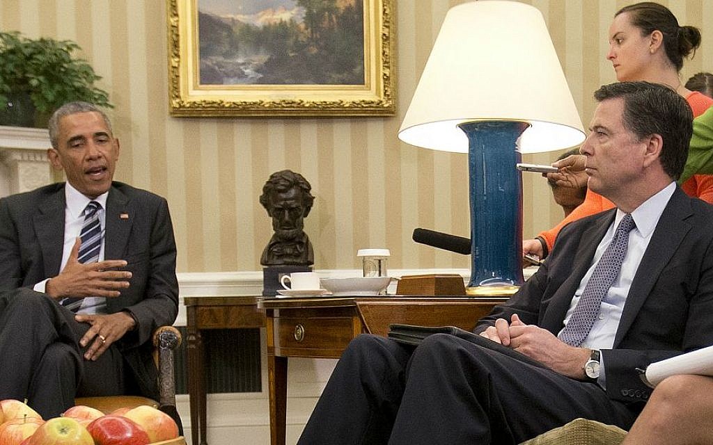 FBI Director James Comey, right, listens to President Barack Obama, left, speak to members of the media in the Oval Office of the White House in Washington, Monday, June 13, 2016, after receiving updates on the Orlando massacre. (AP Photo/Pablo Martinez Monsivais) FBI Director James Comey, right, listens to President Barack Obama, left, speak to members of the media in the Oval Office of the White House in Washington, Monday, June 13, 2016, after receiving updates on the Orlando massacre. (AP Photo/Pablo Martinez Monsivais)