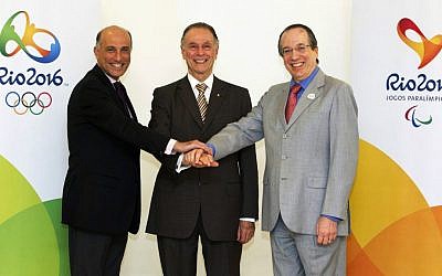 The Jewish trio in charge of the Rio Olympics: Carlos Arthur Nuzman flanked by Sidney Levy, left, and Leonardo Gryner, Nov. 9, 2012. (Marcio Rodrigues/via JTA)