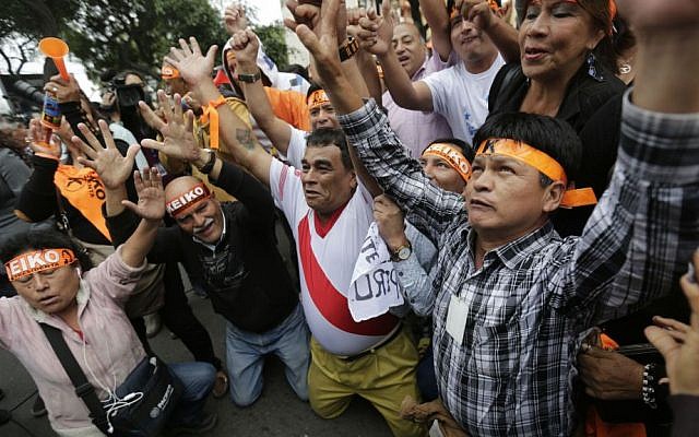 Supporters of presidential candidate Keiko Fujimori react as they listen to exit poll results in Lima, Peru, Sunday, June 5, 2016. (AP Photo/Silvia Izquierdo) Supporters of presidential candidate Keiko Fujimori react as they listen to exit poll results in Lima, Peru, Sunday, June 5, 2016. (AP Photo/Silvia Izquierdo)