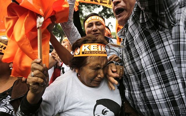 Supporters of presidential candidate Keiko Fujimori react as they listen to exit poll results in Lima, Peru, Sunday, June 5, 2016. (AP Photo/Silvia Izquierdo) Supporters of presidential candidate Keiko Fujimori react as they listen to exit poll results in Lima, Peru, Sunday, June 5, 2016. (AP Photo/Silvia Izquierdo)