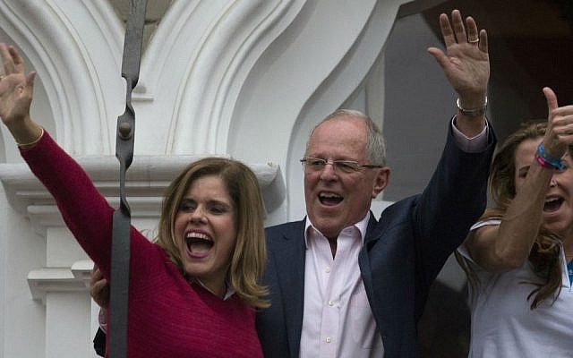 Presidential candidate Pedro Pablo Kuczynski waves to the crowd as he celebrates from the balcony of his house, next to his first vice presidential candidate, Mercedez Araoz, left, and his daughter, in Lima, Peru, Sunday, June 5, 2016. (AP Photo/Rodrigo Abd) Presidential candidate Pedro Pablo Kuczynski waves to the crowd as he celebrates from the balcony of his house, next to his first vice presidential candidate, Mercedez Araoz, left, and his daughter, in Lima, Peru, Sunday, June 5, 2016. (AP Photo/Rodrigo Abd)