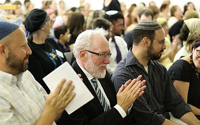 Rabbi Daniel Landes, center, surrounded by his students at a June 7, 2016, private ordination ceremony in Jerusalem. (Naama Marinberg)