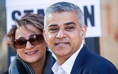 Sadiq Khan, the victorious Labour Party candidate for London mayor, and his wife Saadiya Khan, pose for photographers after voting in the elections on Thursday, May 5, 2016. (Simon Dawson/Bloomberg, via JTA)