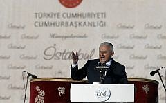 Turkey's new Prime Minister Binali Yildirim addresses onlookers during celebrations marking the 563rd anniversary of the Ottoman conquest of Constantinople, now Istanbul, in Istanbul, Turkey, Sunday, May 29, 2016. (AP Photo/Emrah Gurel)