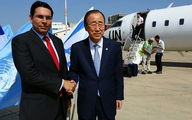 Israel's Ambassador to the UN, Danny Danon, greets UN Secretary-General Ban Ki-moon on his arrival in Israel, June 27, 2016 (Avi Davidi)